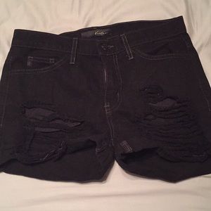 Black distressed shorts